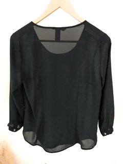 Imagen de Remera H&M con volados talle 6 US negra