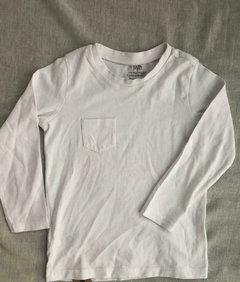 Remera manga larga H&M blanca con bolsillo unisex talle 1-2 años en internet
