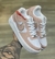 Nike Air Force One Branco/ Rose detalhea dourado