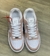 Nike Air Force One Branco/ Rose detalhea dourado na internet