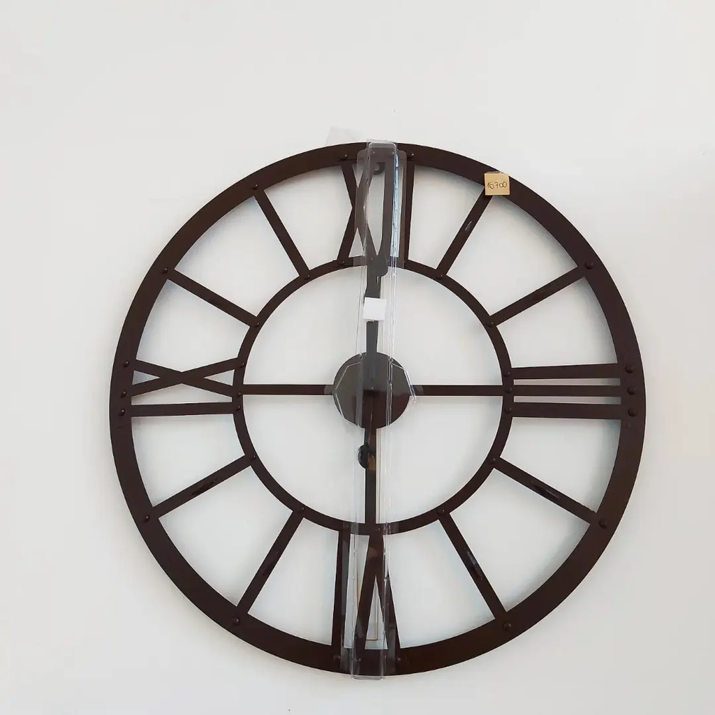 Reloj de pared discount con números romanos