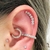 Piercing cluster florzinhas cravejado na internet