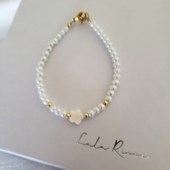 *New* Pulsera Dona de pelas y acero dorado - comprar online