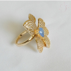 Anel Flor Pedra Azul Cravejado Regulável banhado em ouro 18k - comprar online