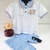 Conjunto Ser Garoto Bermuda de Sarja Azul e Camisa Polo Branca