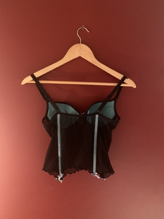 Corselet preto e azul na internet