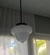 (JB) Una lampara de opalina blanca y hierro. / diámetro 30 × 30 × 80