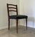 (MG) Cinco sillas tapizadas en cuerina negra y tachas / 50 x 40 x 84