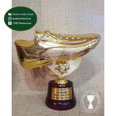 Trofeo botín de oro plástico en base de madera