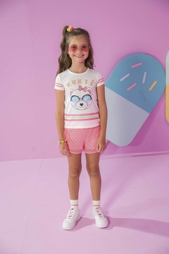 Conjunto Infantil Kukiê Neon Ursinha com shorts em tela na internet