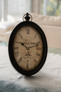 Reloj de pared vintage, metal y vidrio