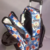 Mochila Escolar Niño Carro Carrito Reforzada Simil Trendy en internet