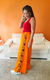 Calça wide laranja em malha com aplicações em tecido africano - loja online