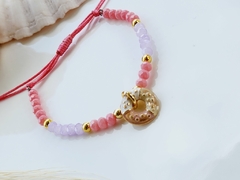 Pulseira de Cristais de Vidro Rosa e Lilás com Pingente Doce Rosquinha -