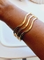 Bracelete Dourado ou Prateado em Formato de Ondas na internet