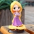 Imagem do QPOSKET RAPUNZEL DISNEY BANPRESTO BANDAI