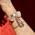 Bracelete Libélula Rosa e Madrepérola no braço