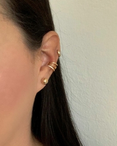 PIERCING FAKE TRIPLO CORAÇÕES BANHO OURO 18K - FABI na internet