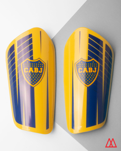 Canilleras De Fútbol BOCA. Marca: DRB - comprar online