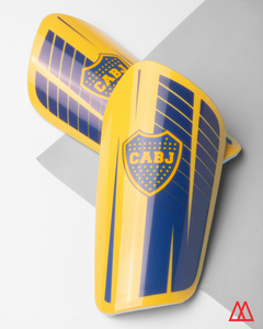 Canilleras De Fútbol BOCA. Marca: DRB