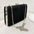 Clutch negro de mano y con cadena desmontable - comprar online