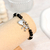 Pulsera elástica negro 10