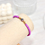 Pulsera elástica violeta 52