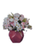 Arranjo com flores variadas no vaso de cerâmica rosa