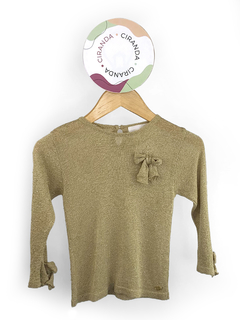 Blusa em lurex dourado manga longa com detalhes em laços nas manhas e no lado esquerdo do peito Paola da Vinci Tam 2 usado em bom estado