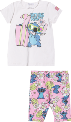 Conjunto infantil com blusa branca estampada com Stitch segurando uma prancha de surfe e legging rosa com desenhos do Stitch em flores tropicais.