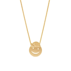 Dije carita de nene laminado en oro 18k arenado. - comprar online