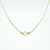 Colar Choker Banhado a ouro 18K com um ponto de luz no meio - comprar online