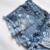 SHORT DE JEAN CON ROTURAS - comprar online