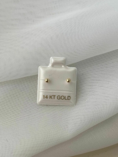 Aretes bolita lisa oro 14kt