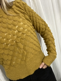 Sweater trama puño