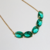 CHOKER OVAL CRISTAIS VERDES NO OURO