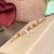 Brinco Flor de Cerejeira Baby/ Segundo Furo - Ouro 18K - loja online