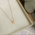 Colar Medalha Coração Mini - Ouro 18K - comprar online