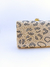 Bolsa clutch animal print DONNA BRASIL - NINA MELANINA BRECHÓ