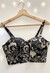 Top cropped preto estampa bege floral na internet