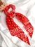 Xuxinha scrunchie laço comprido vermelho detalhado