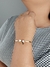 Bracelete dourado de lacinho - comprar online