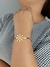 Bracelete dourado de margarida - comprar online