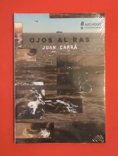Ojos al ras - Juan Carra