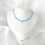 Choker cristal azul com gota ouro