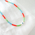 Choker cristais azul, laranja e verde com olho grego ouro - comprar online