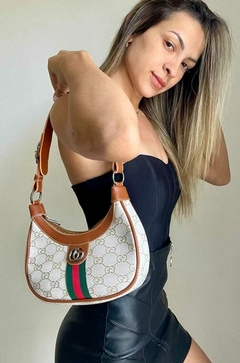 Bolsa Gucci Meia Lua na internet