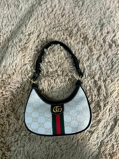 Bolsa Gucci Meia Lua na internet