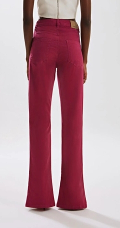 CALCA IÓDICE SKINNY FLARE CÓS ALTO ABERTURA BARRA PINK - loja online