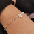 Pulseira com bolinhas e anjo em prata 925 - comprar online